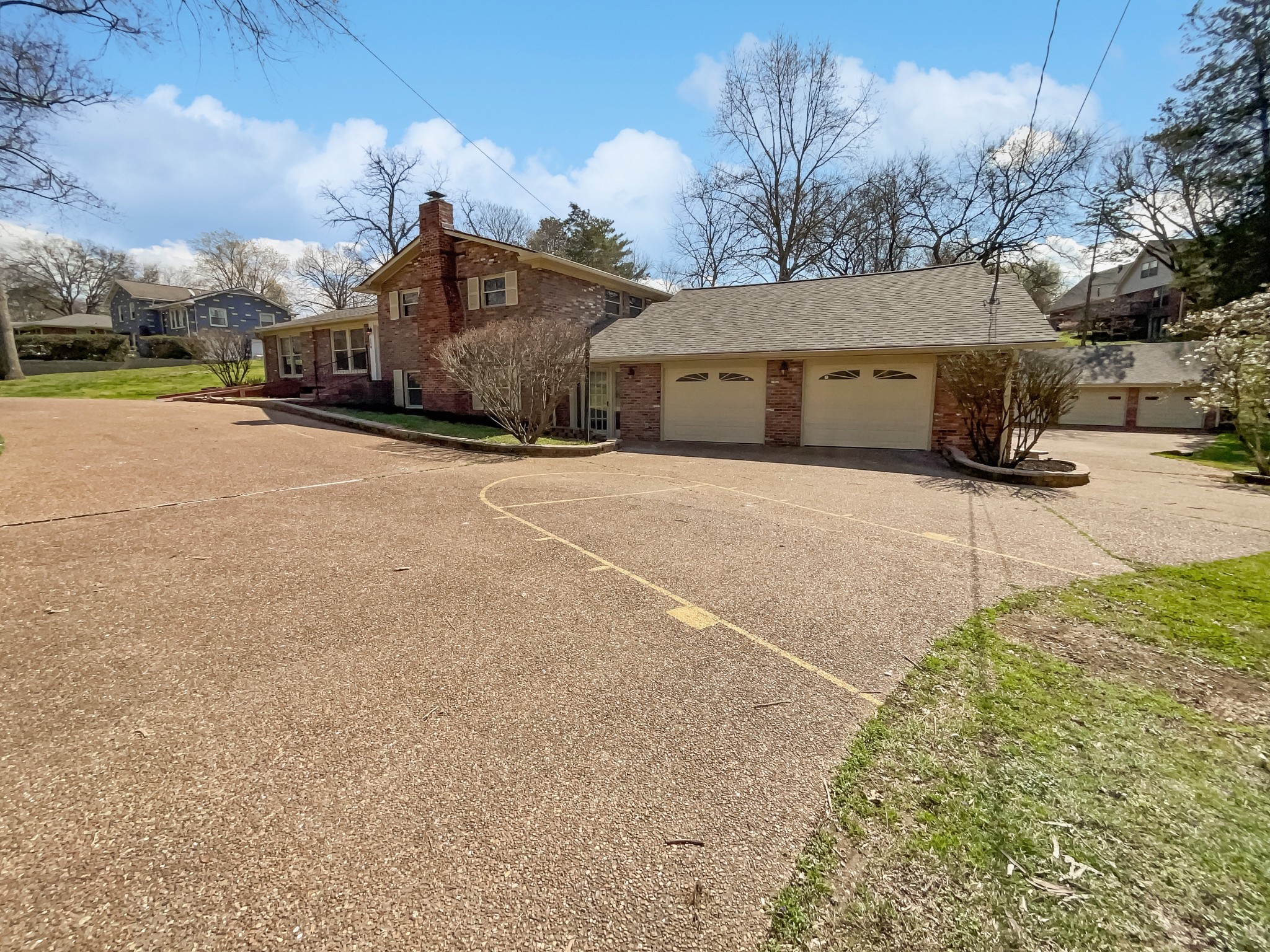 158 Spring Valley Road Nashville, TN 37214 - Photo 14 of 29 a view of a house with a yard and garage