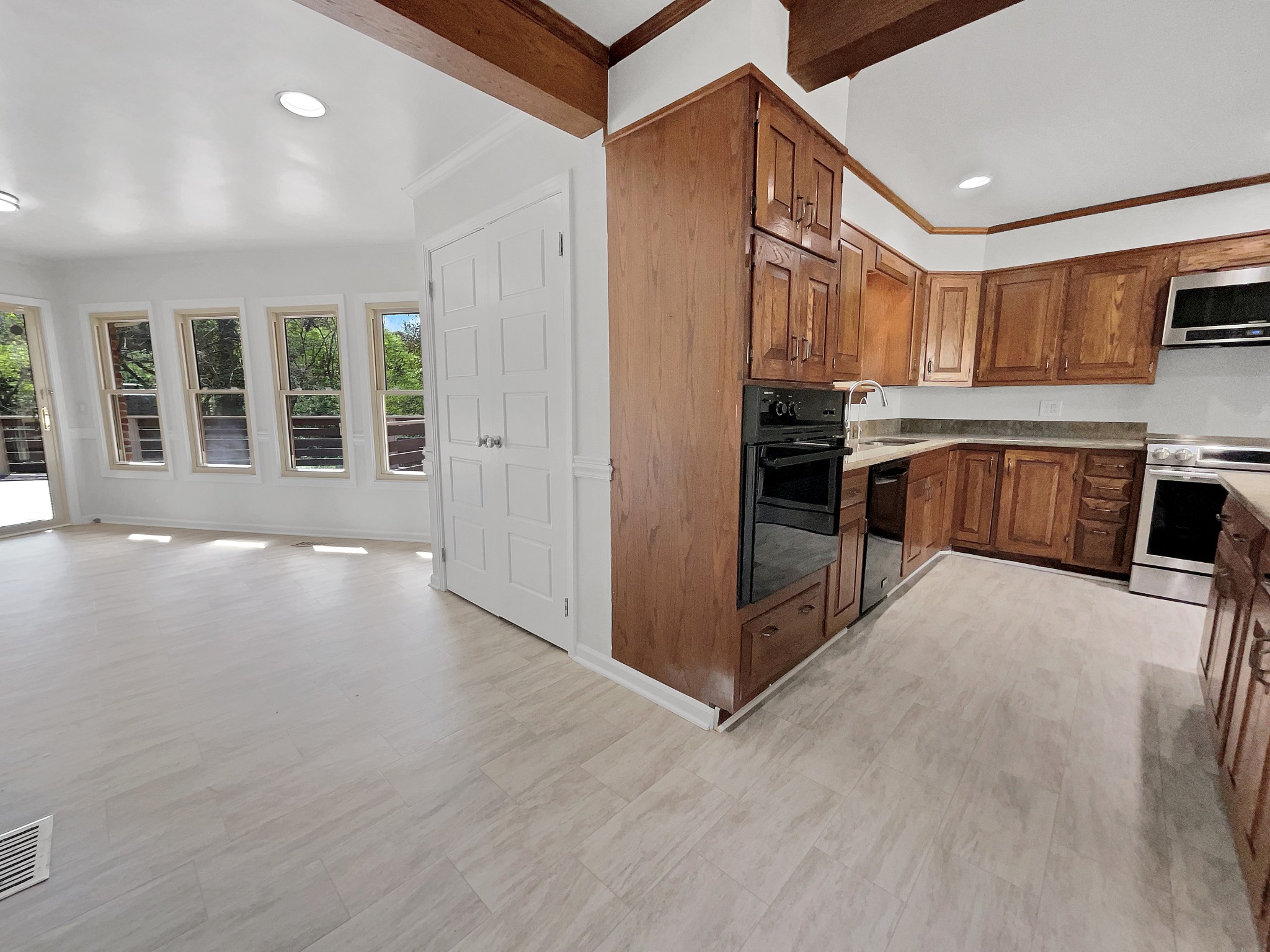 158 Spring Valley Road Nashville, TN 37214 - Photo 16 of 29 a view of a kitchen with a sink and cabinets