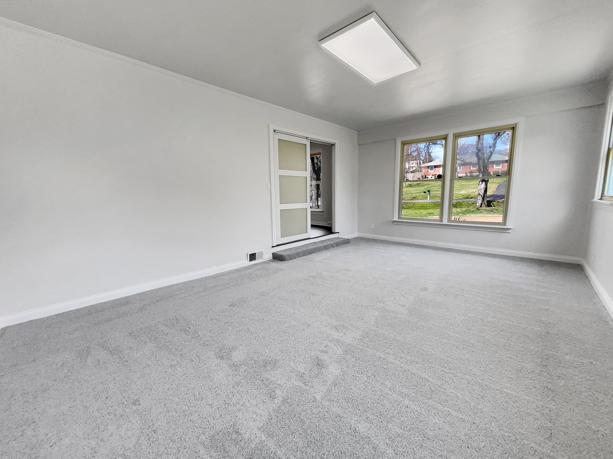 158 Spring Valley Road Nashville, TN 37214 - Photo 17 of 29 an empty room with windows
