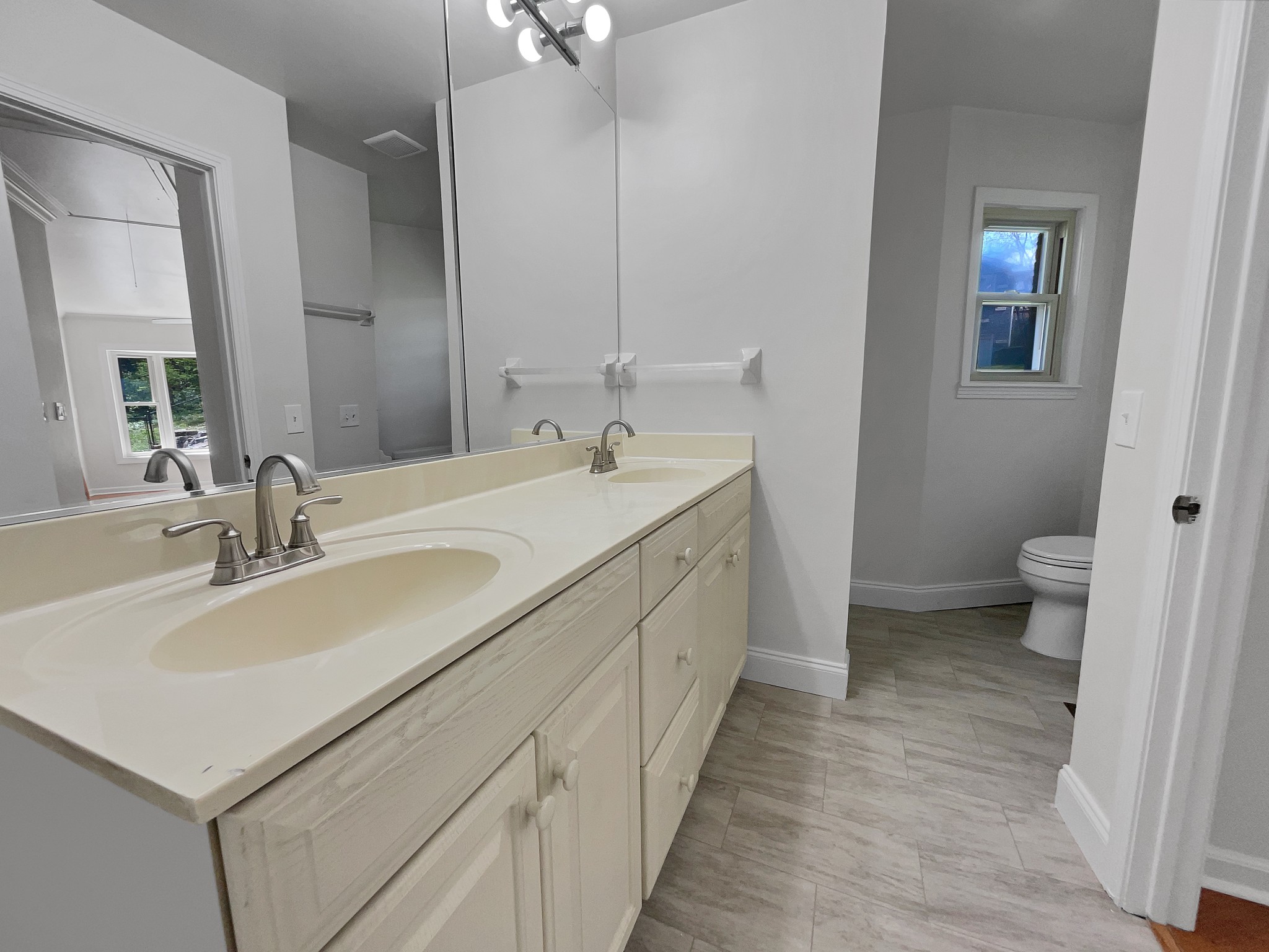 158 Spring Valley Road Nashville, TN 37214 - Photo 7 of 29 a bathroom with a sink and a mirror