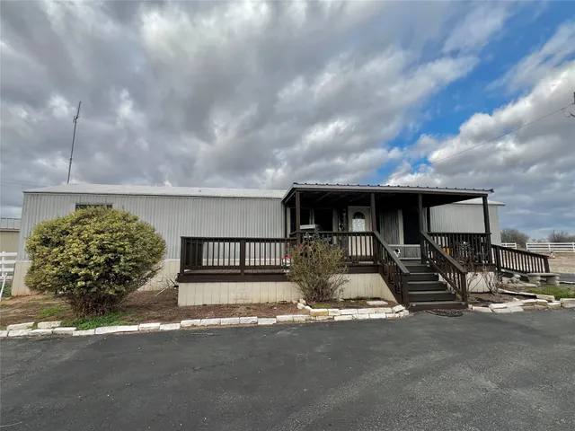 a view of a house with a patio