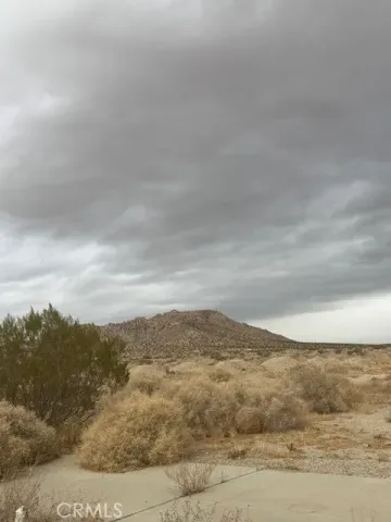 a view of mountain with lake view