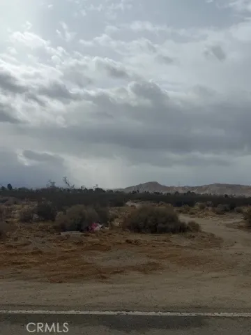 a view of ocean and mountain