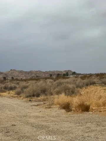 a view of ocean and mountain