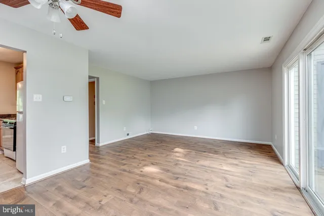 an empty room with windows