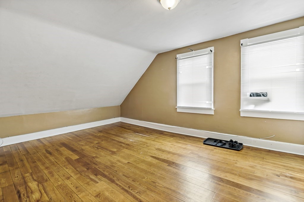 69 Locust Street New Bedford, MA 02740 - Photo 31 of 40 a view of an empty room and window