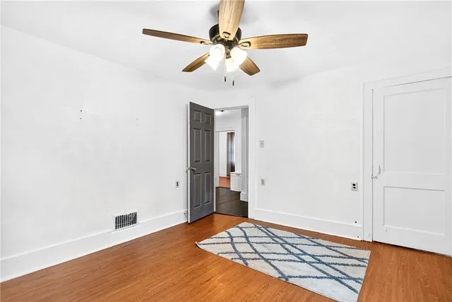 a blue and white painting on the wall