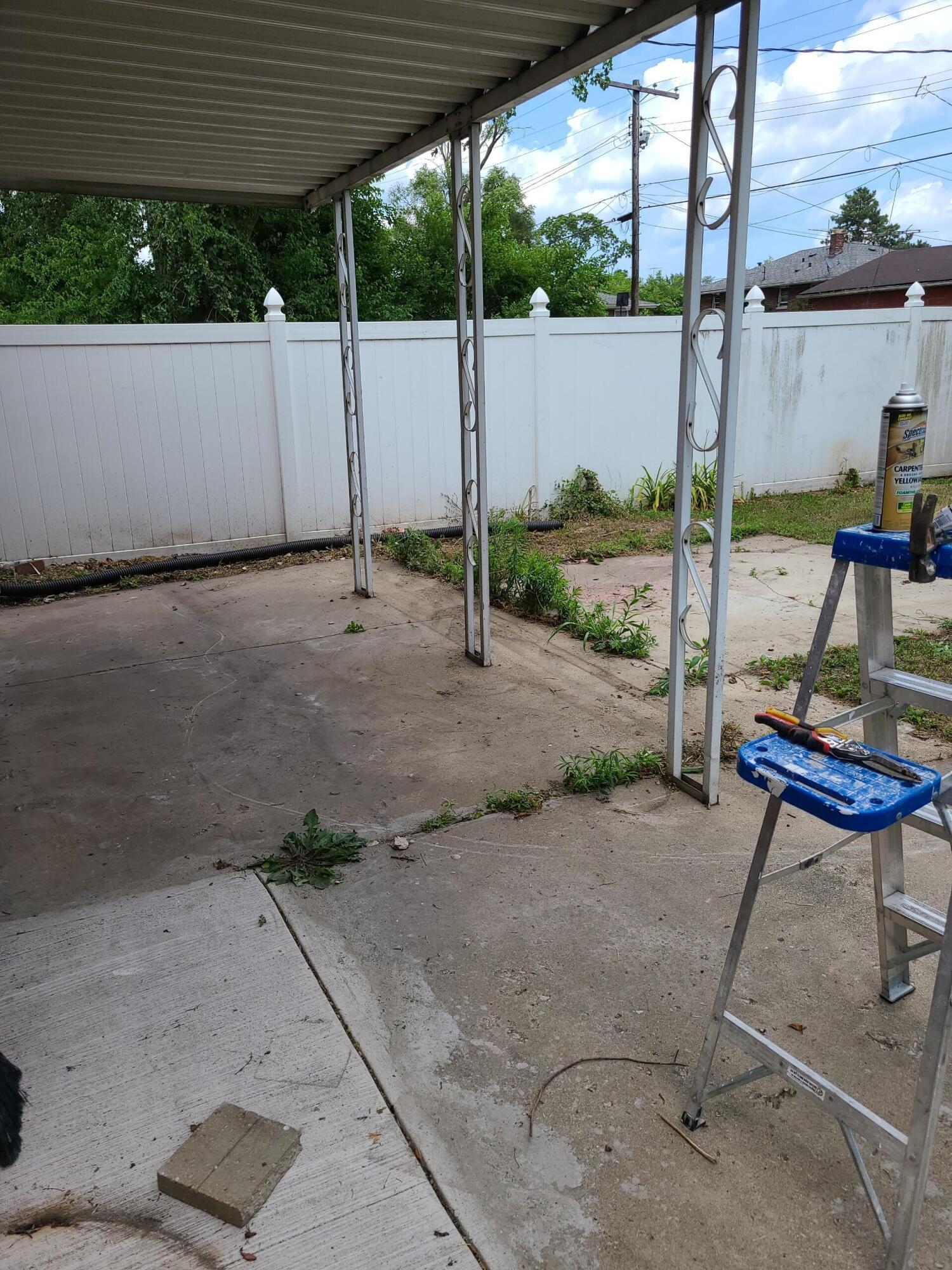 2371 Monroe Street Gary, IN 46407 - Photo 13 of 17 a backyard of a house with table and chairs