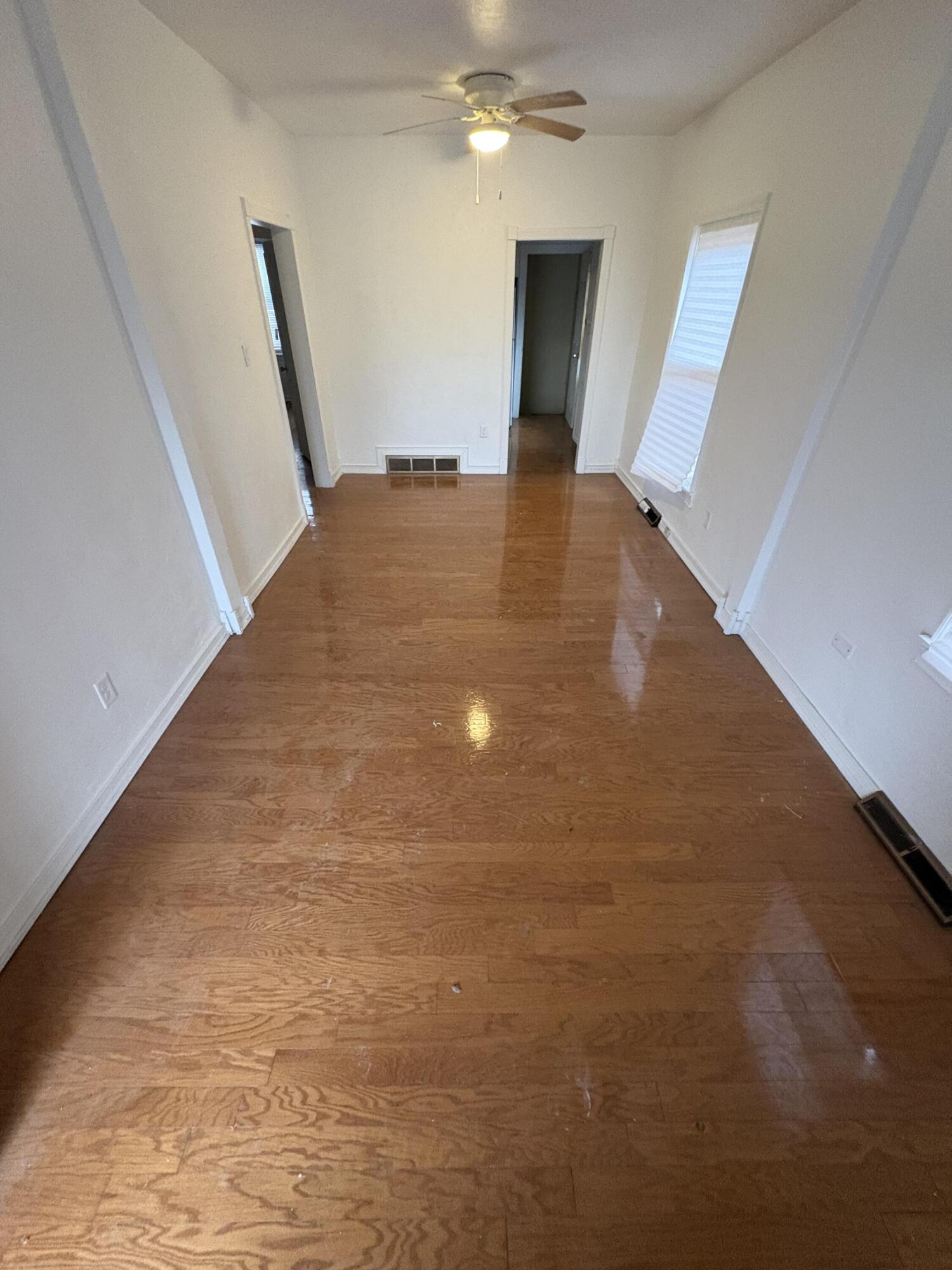 2371 Monroe Street Gary, IN 46407 - Photo 2 of 17 a view of a livingroom with a staircase
