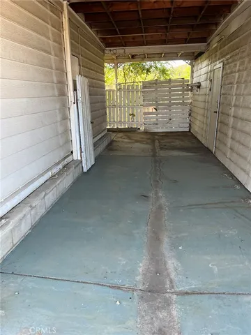 a view of a room with racks on the wall