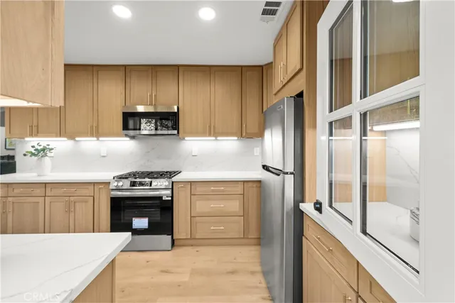 a workspace with furniture and window