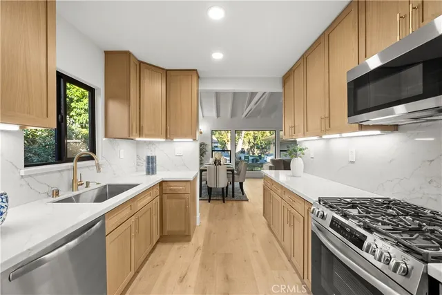 a workspace with furniture and a potted plant