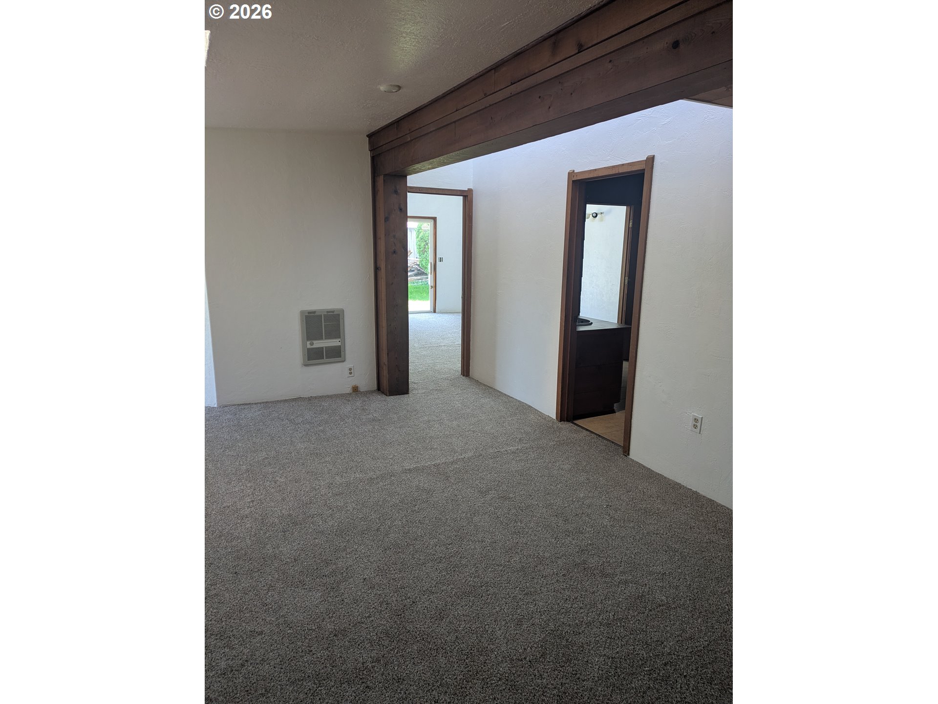 1116 7th Street Florence, OR 97439 - Photo 7 of 15 a view of a hallway with closet