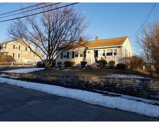 11 Crestview Road Waltham, MA 02451 - Photo 1 of 14 a front view of a house with a yard