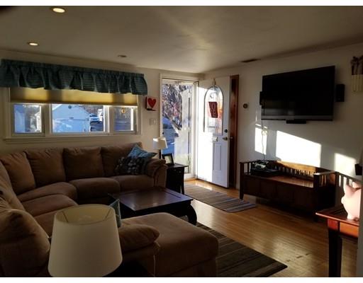 11 Crestview Road Waltham, MA 02451 - Photo 6 of 14 a living room with furniture and a flat screen tv