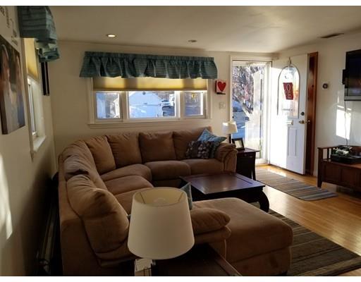 11 Crestview Road Waltham, MA 02451 - Photo 7 of 14 a living room with furniture and a flat screen tv