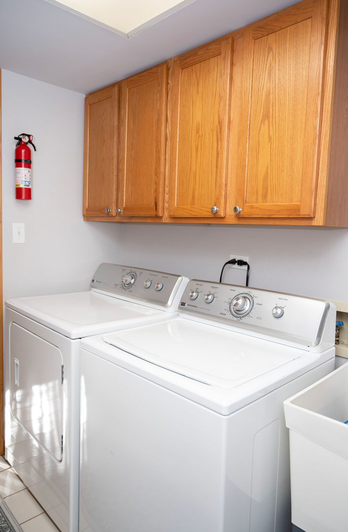 18124 Rita Road, Unit 2C Tinley Park, IL 60477 - Photo 11 of 23 a utility room with dryer and washer