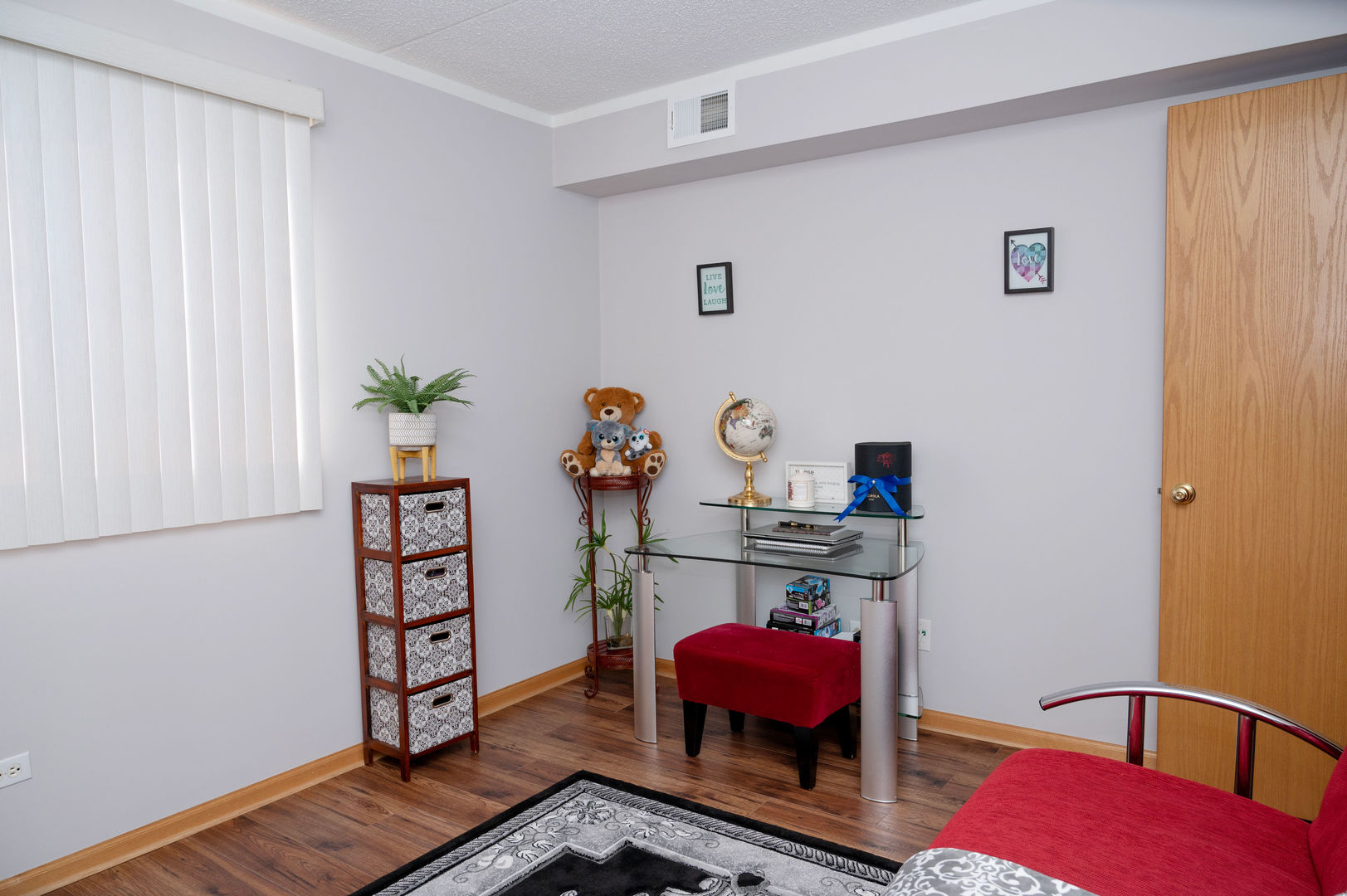 18124 Rita Road, Unit 2C Tinley Park, IL 60477 - Photo 18 of 23 a room with furniture and wooden floor