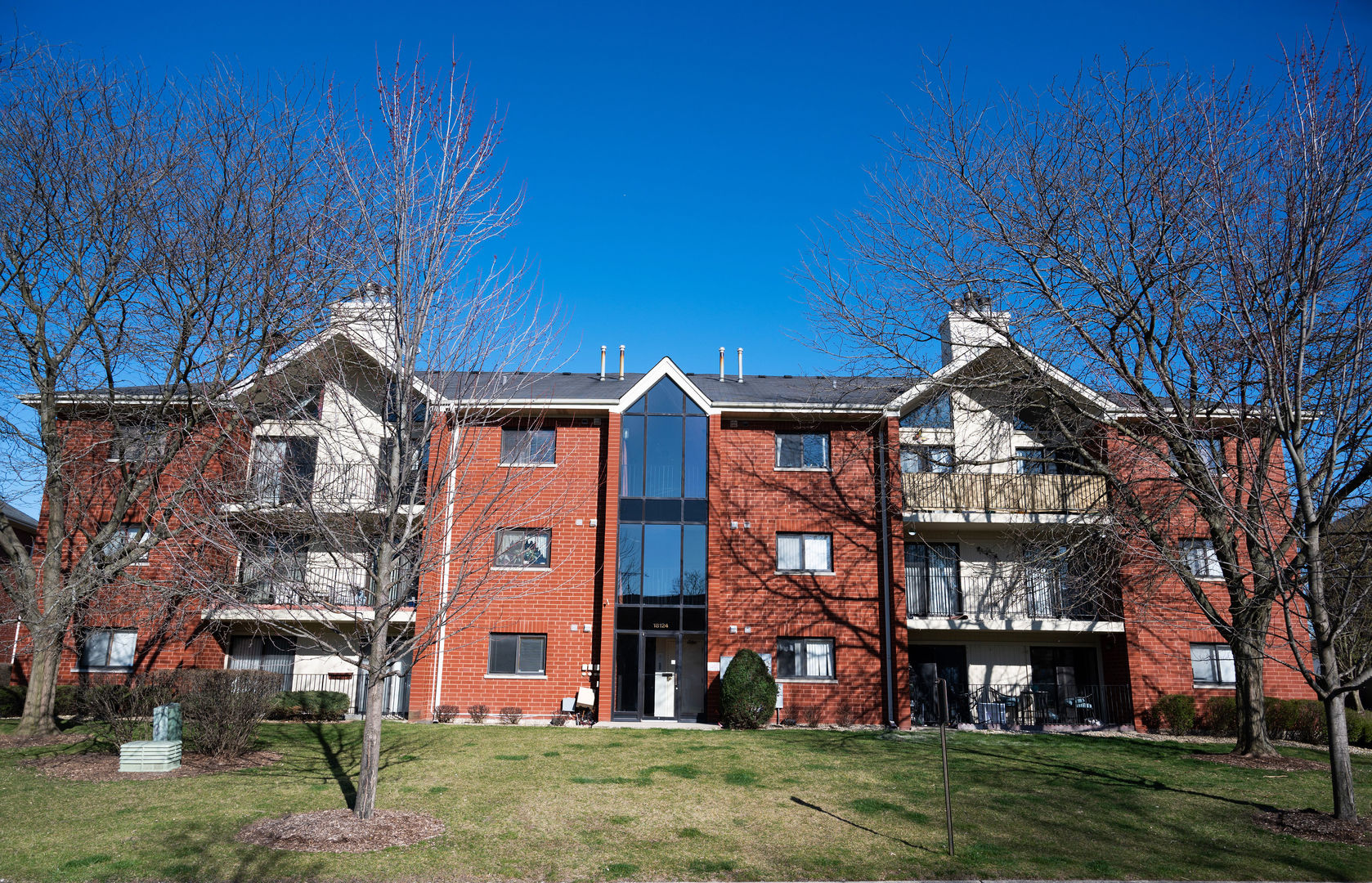 18124 Rita Road, Unit 2C Tinley Park, IL 60477 - Photo 2 of 23 a building view with a outdoor space