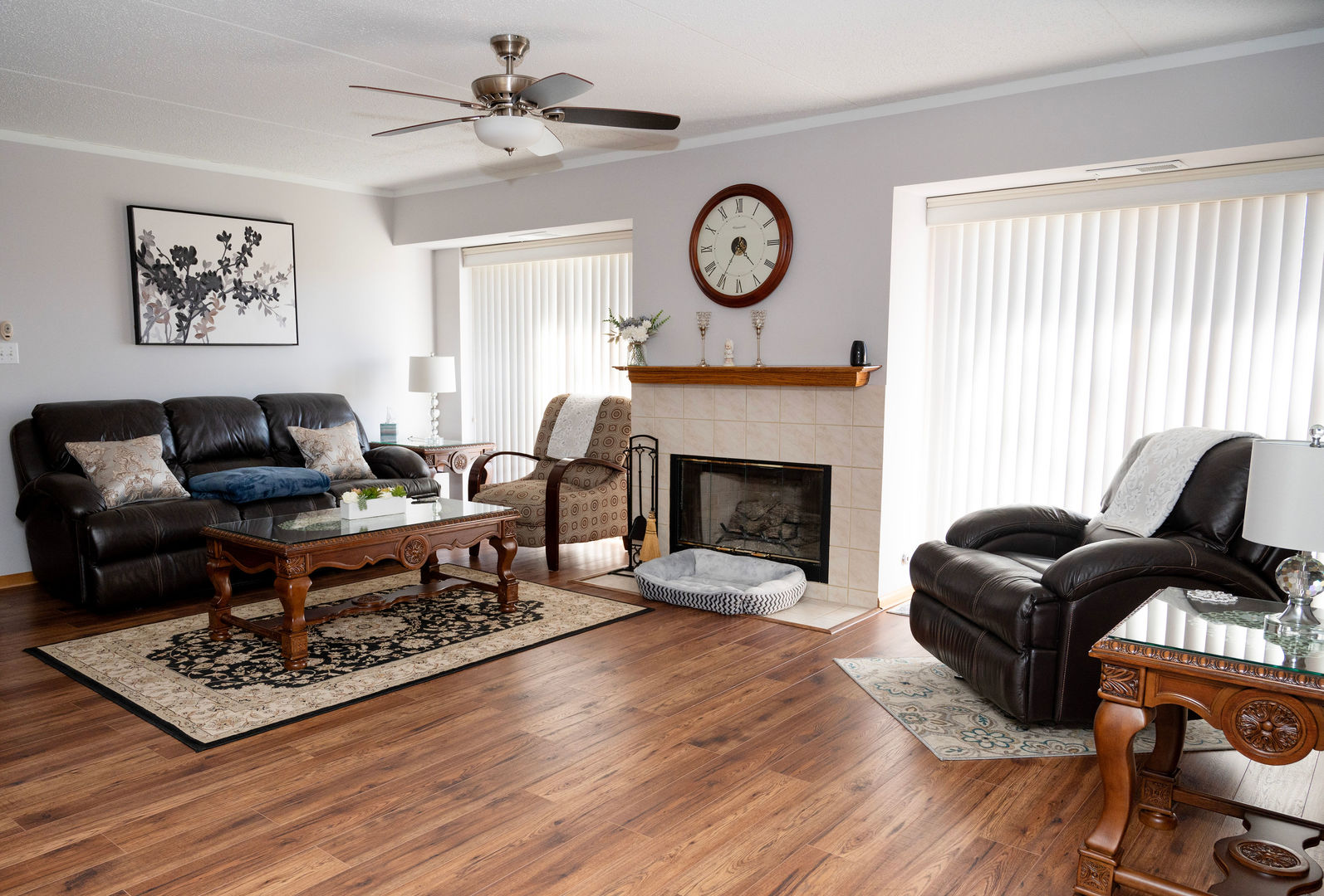 18124 Rita Road, Unit 2C Tinley Park, IL 60477 - Photo 3 of 23 a living room with furniture a fireplace and a window