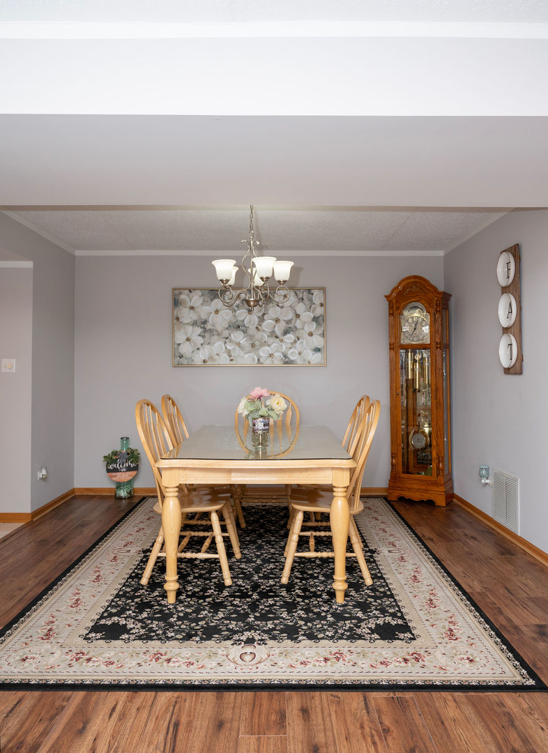 18124 Rita Road, Unit 2C Tinley Park, IL 60477 - Photo 9 of 23 a view of a dining room with furniture
