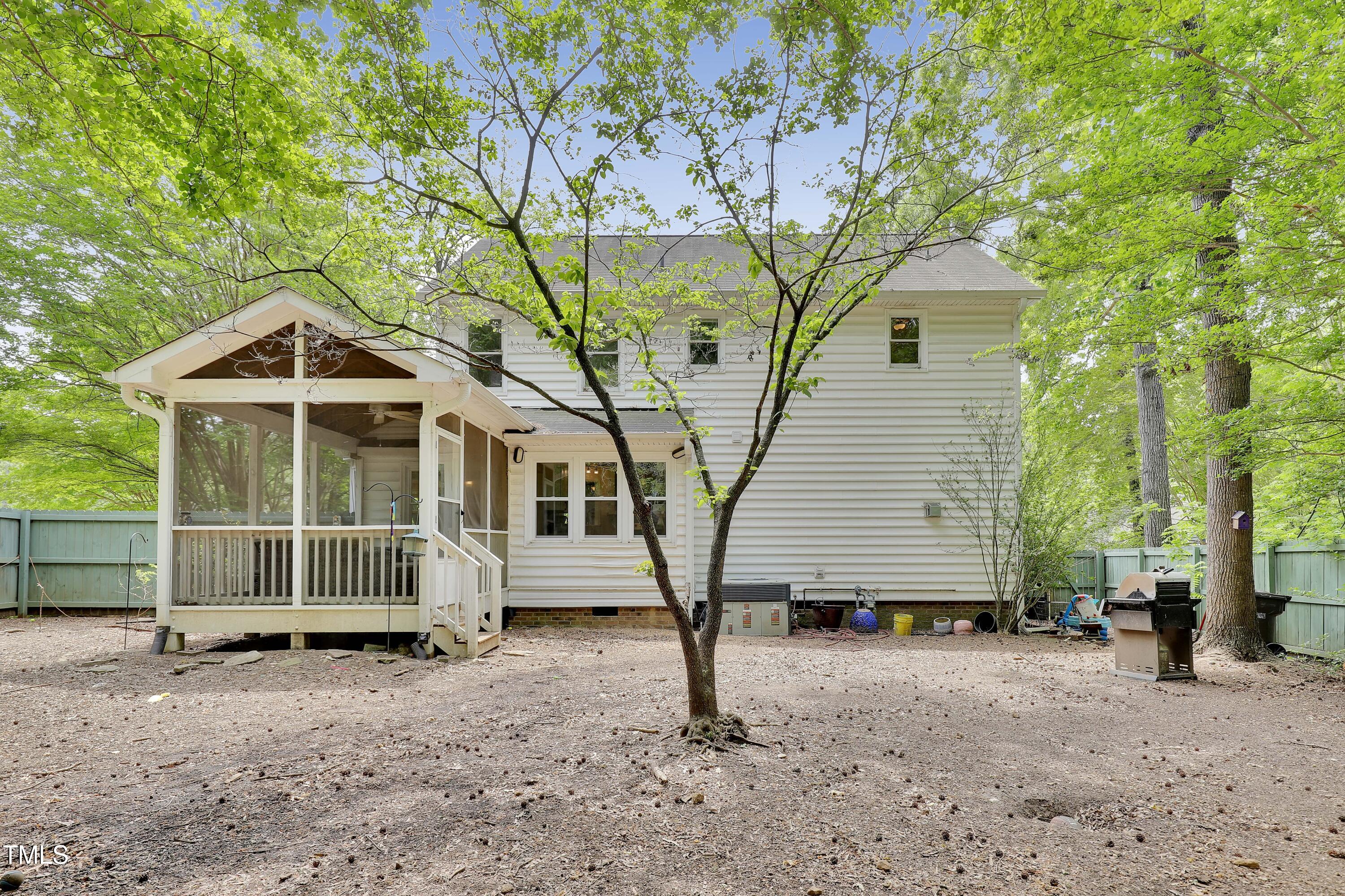4711 Buttonbush Drive Durham, NC 27712 - Photo 32 of 43 a view of a house with a yard