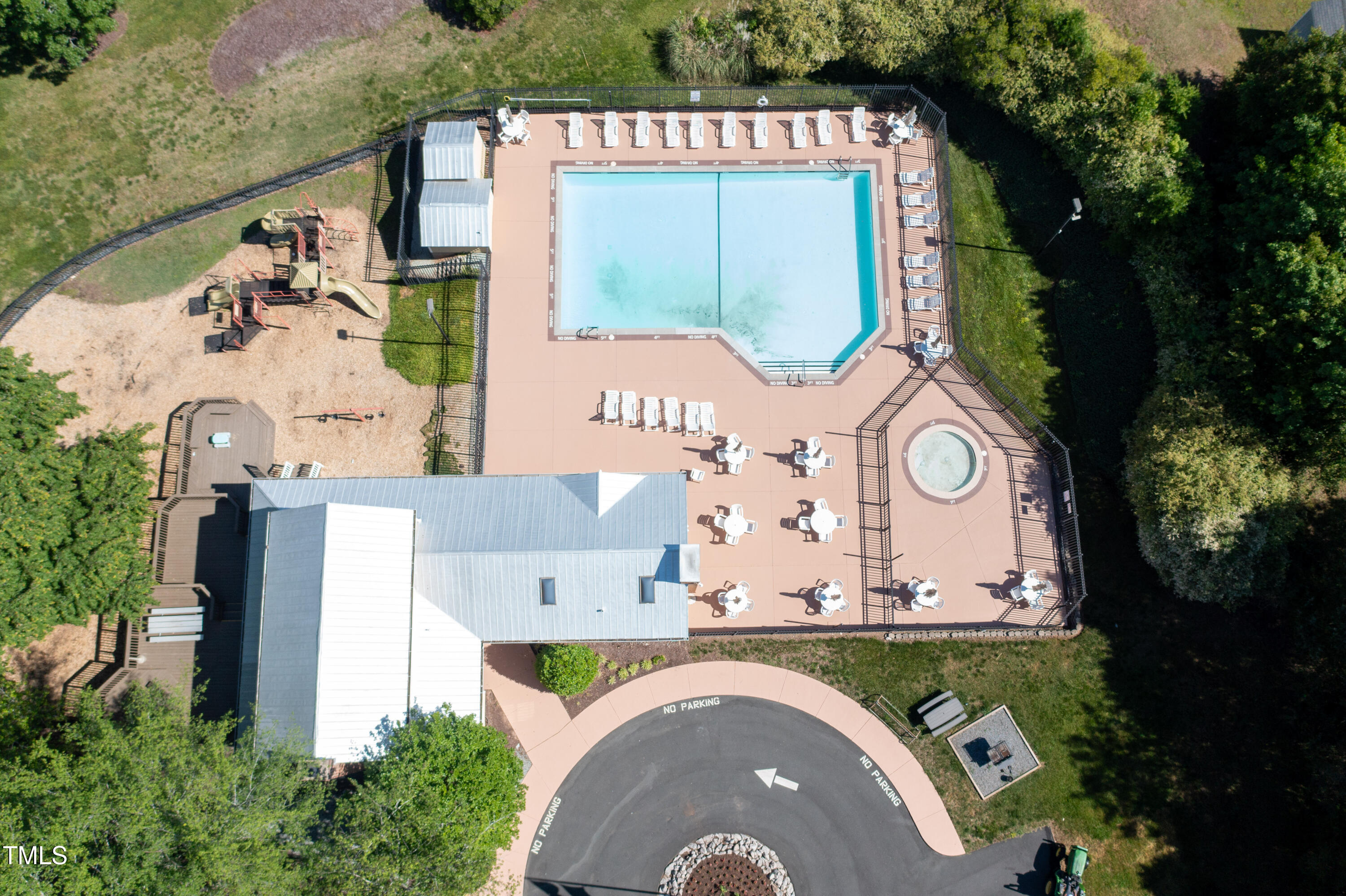 4711 Buttonbush Drive Durham, NC 27712 - Photo 36 of 43 an aerial view of a house with garden space and a swimming pool