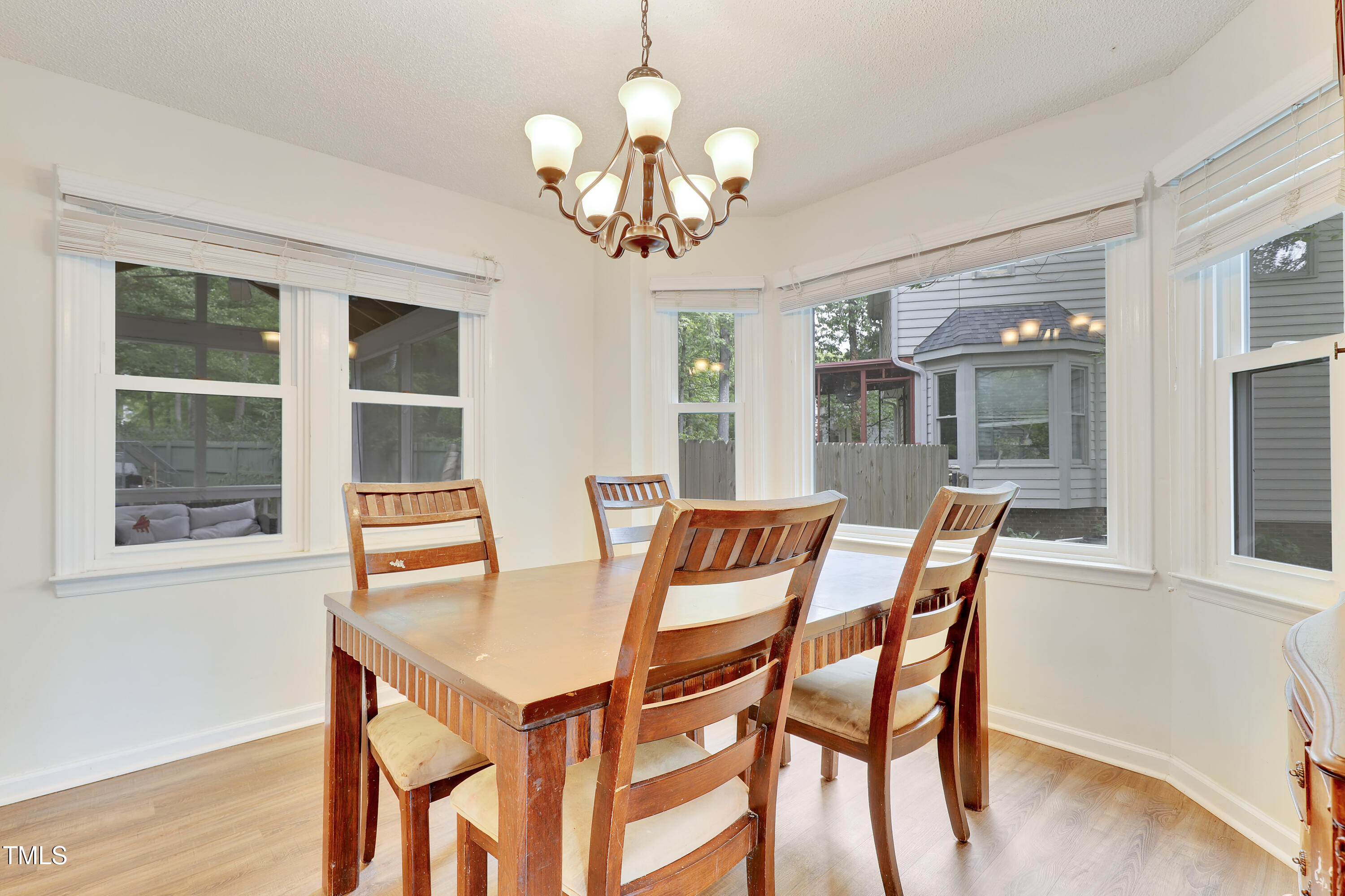 4711 Buttonbush Drive Durham, NC 27712 - Photo 8 of 43 a dining room with furniture and window
