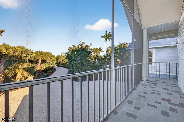 a view of a balcony with window