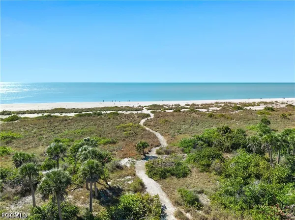 an aerial view of a house with a garden