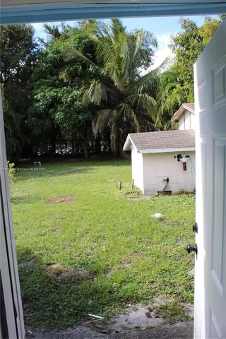 a house view with a garden space