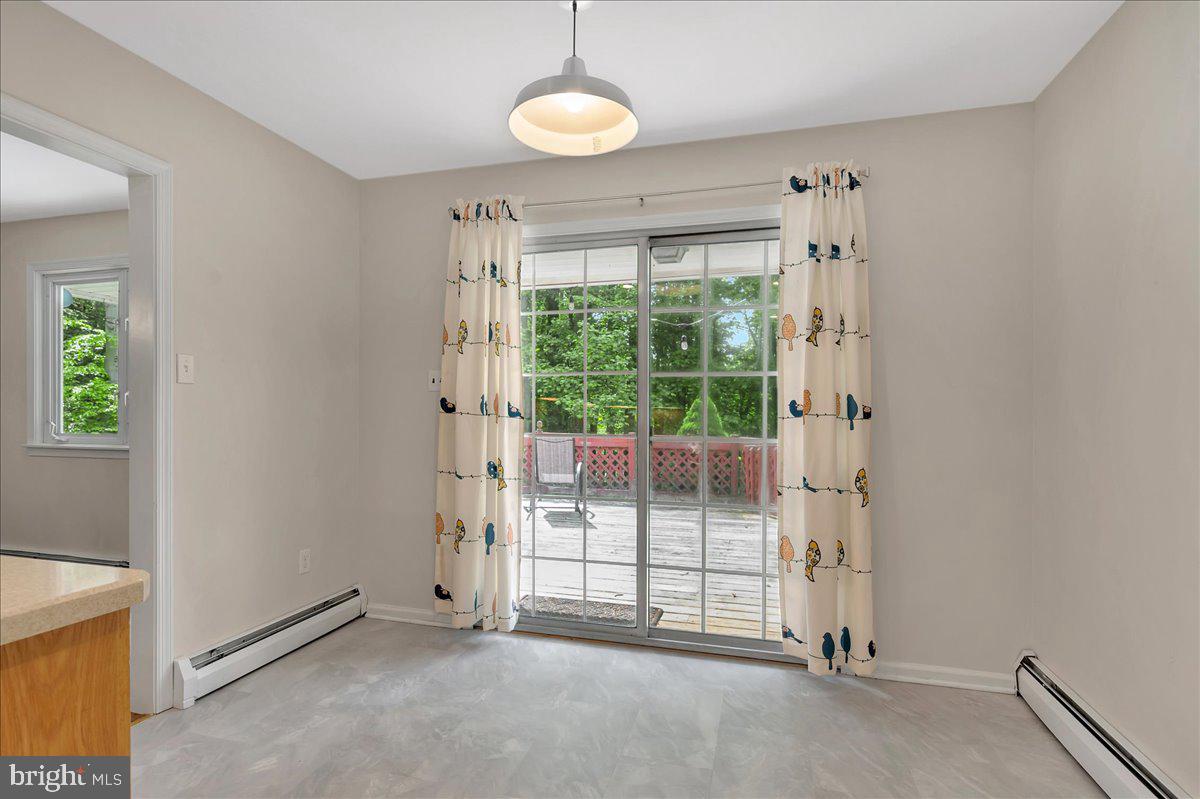 430 Valley Hill Road Exton, PA 19341 - Photo 23 of 44 sliders to back deck overlooking woods