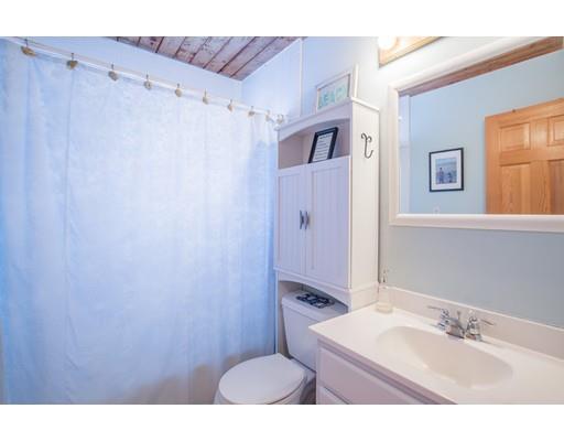 24 Columbia Way Newbury, MA 01951 - Photo 17 of 30 a bathroom with a sink a toilet and shower