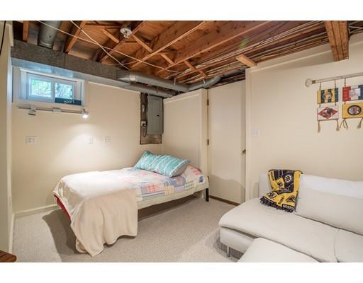 24 Columbia Way Newbury, MA 01951 - Photo 22 of 30 a bedroom with a bed and a walk in closet