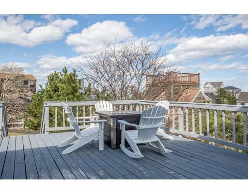 24 Columbia Way Newbury, MA 01951 - Photo 6 of 30 a view of a deck with two chairs and a table