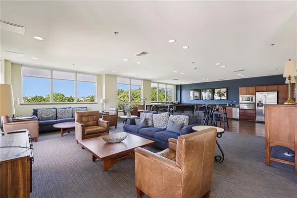 a balcony view with furniture and garden view