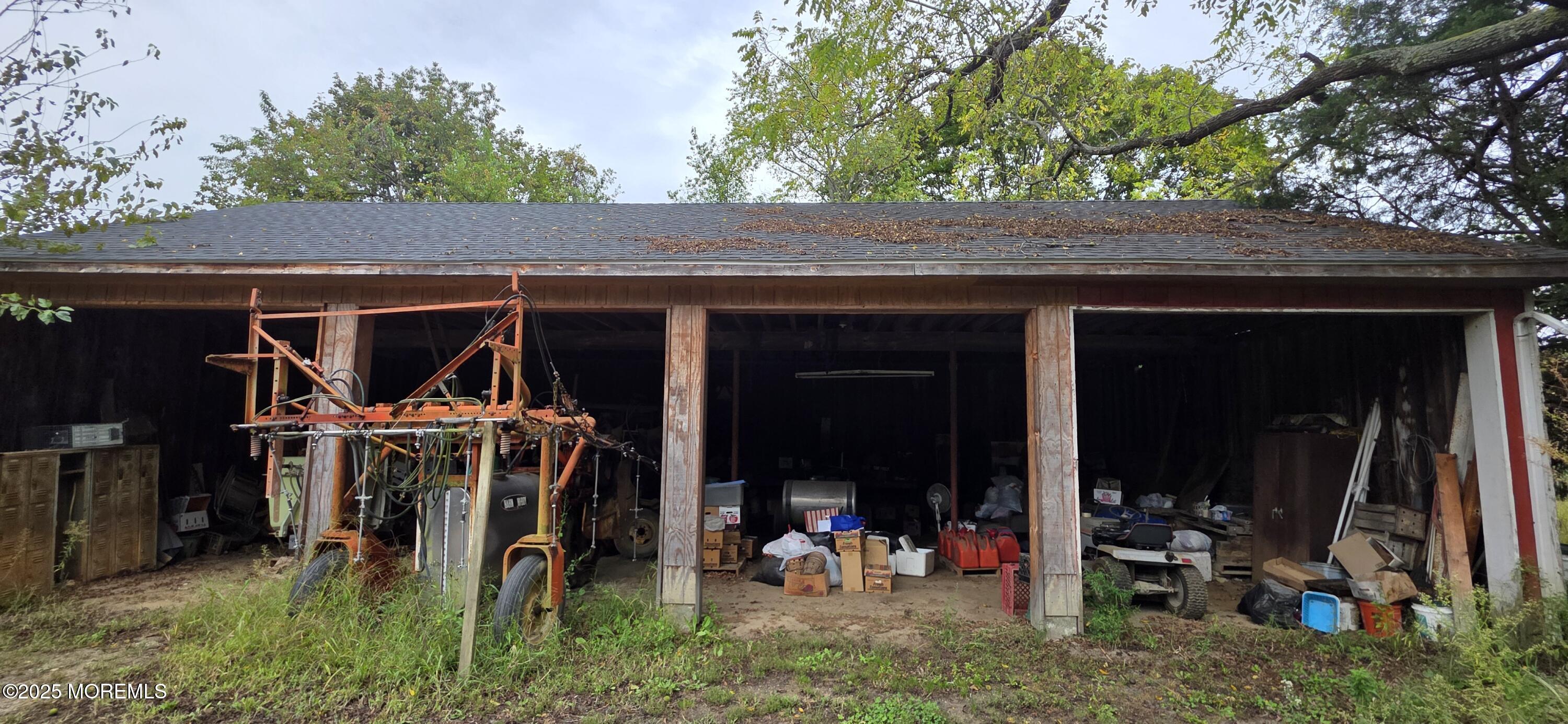 138 Howell Road Freehold, NJ 07728 - Photo 7 of 24 a view of a car garage