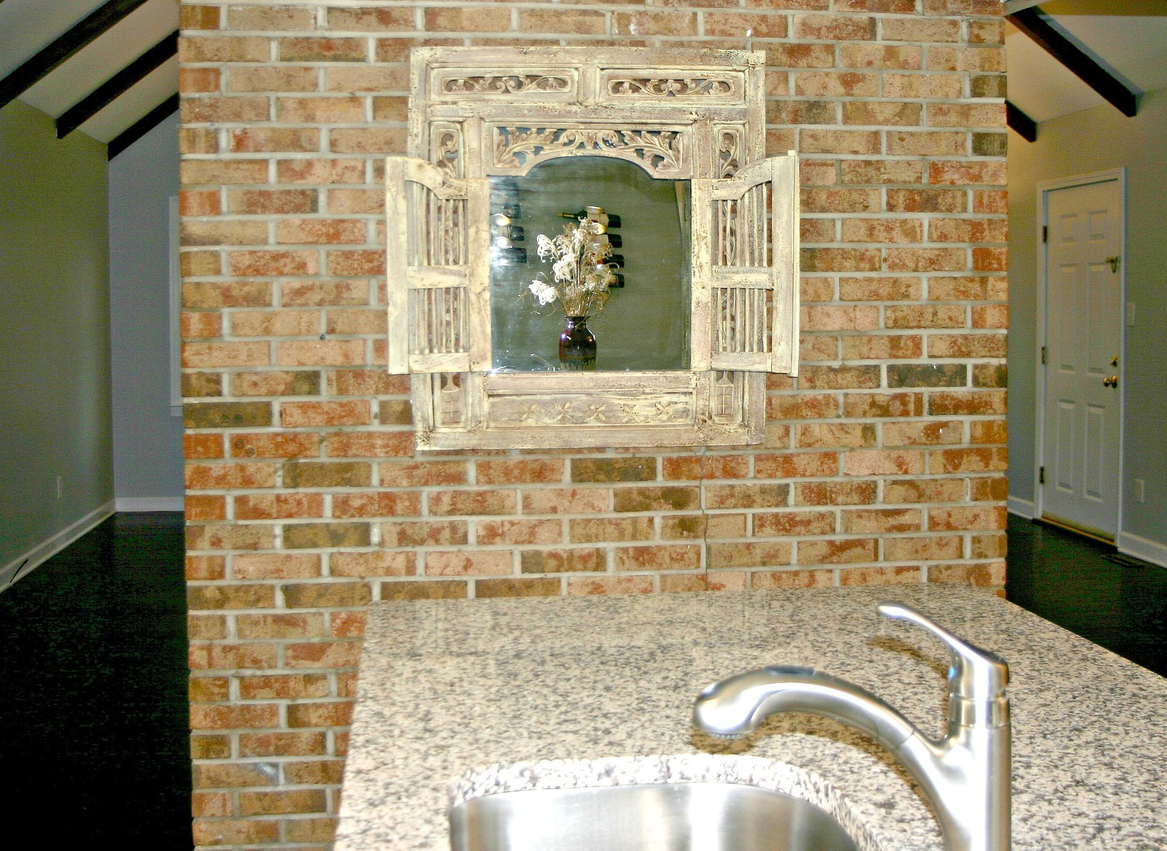 309 Kyloe Road Southern Pines, NC 28387 - Photo 13 of 34 Island to brick wall