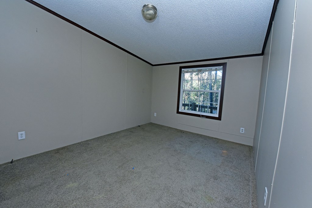 24444 Morganton Highway Blue Ridge, GA 30513 - Photo 21 of 41 an empty room with windows