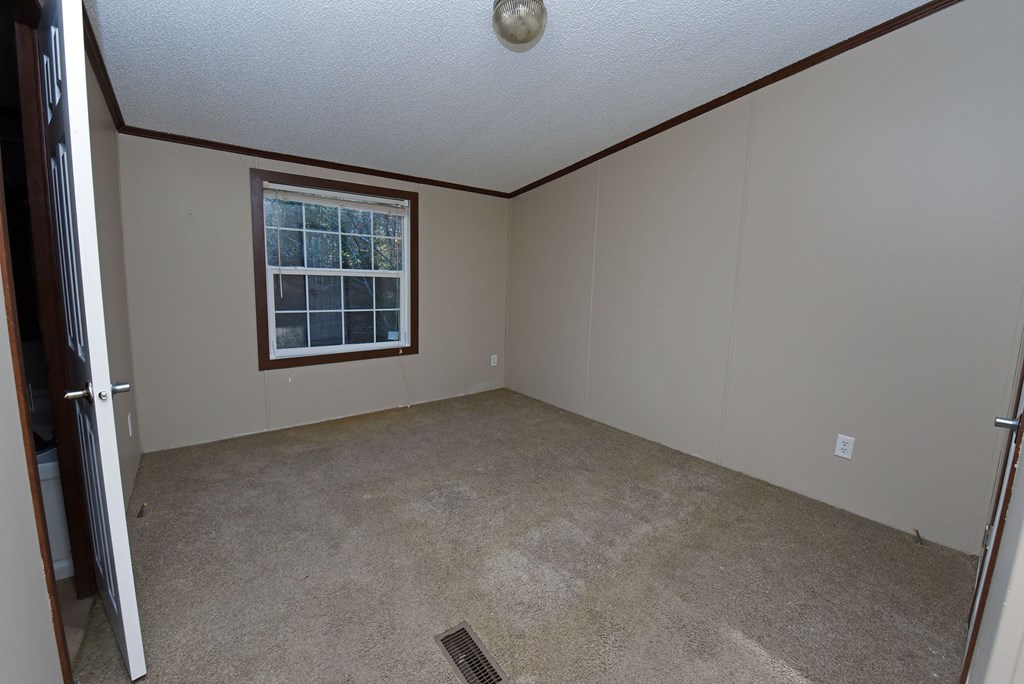 24444 Morganton Highway Blue Ridge, GA 30513 - Photo 23 of 41 an empty room with windows