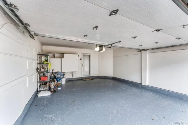 a view of a house with a wooden deck