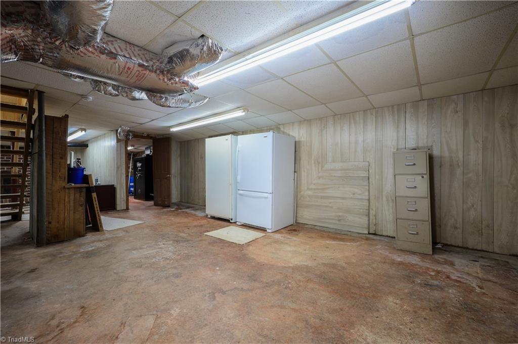 6350 Roscoe Road Denton, NC 27239 - Photo 30 of 50 Basement. Refrigerator and freezer remain.