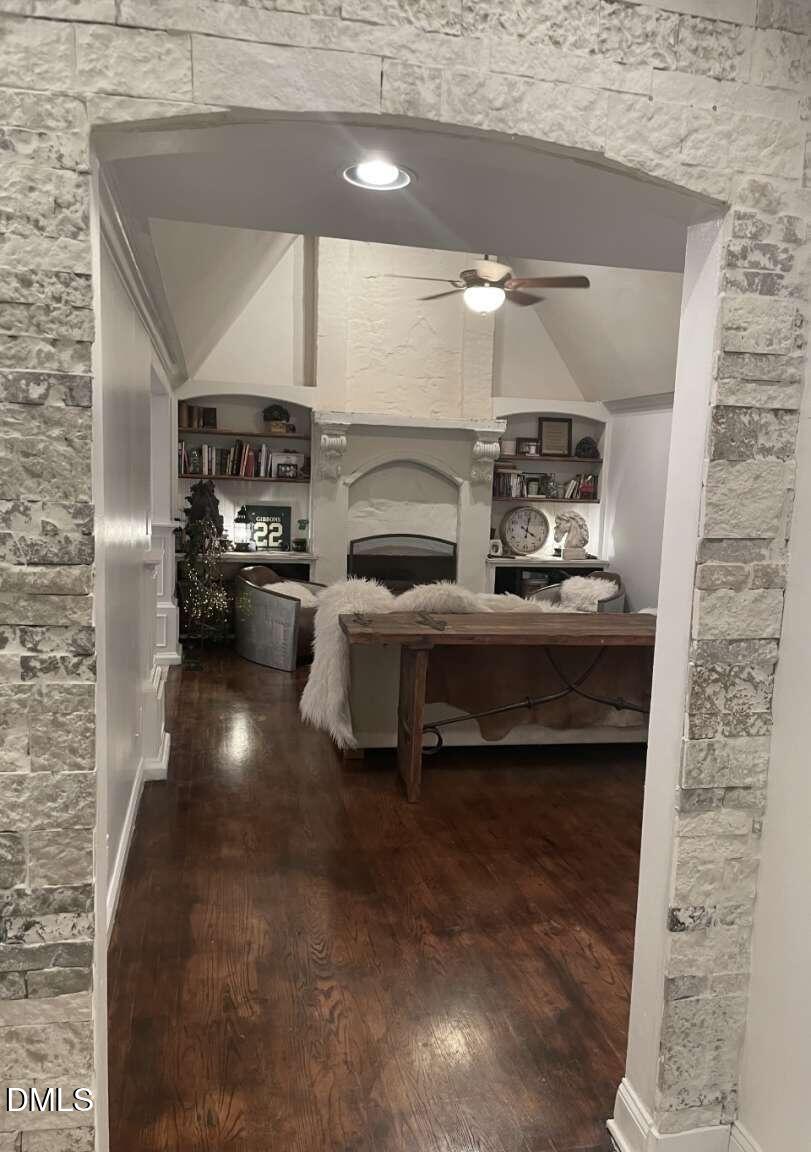 1204 Queensferry Road Cary, NC 27511 - Photo 14 of 50 a living room with furniture and a fireplace