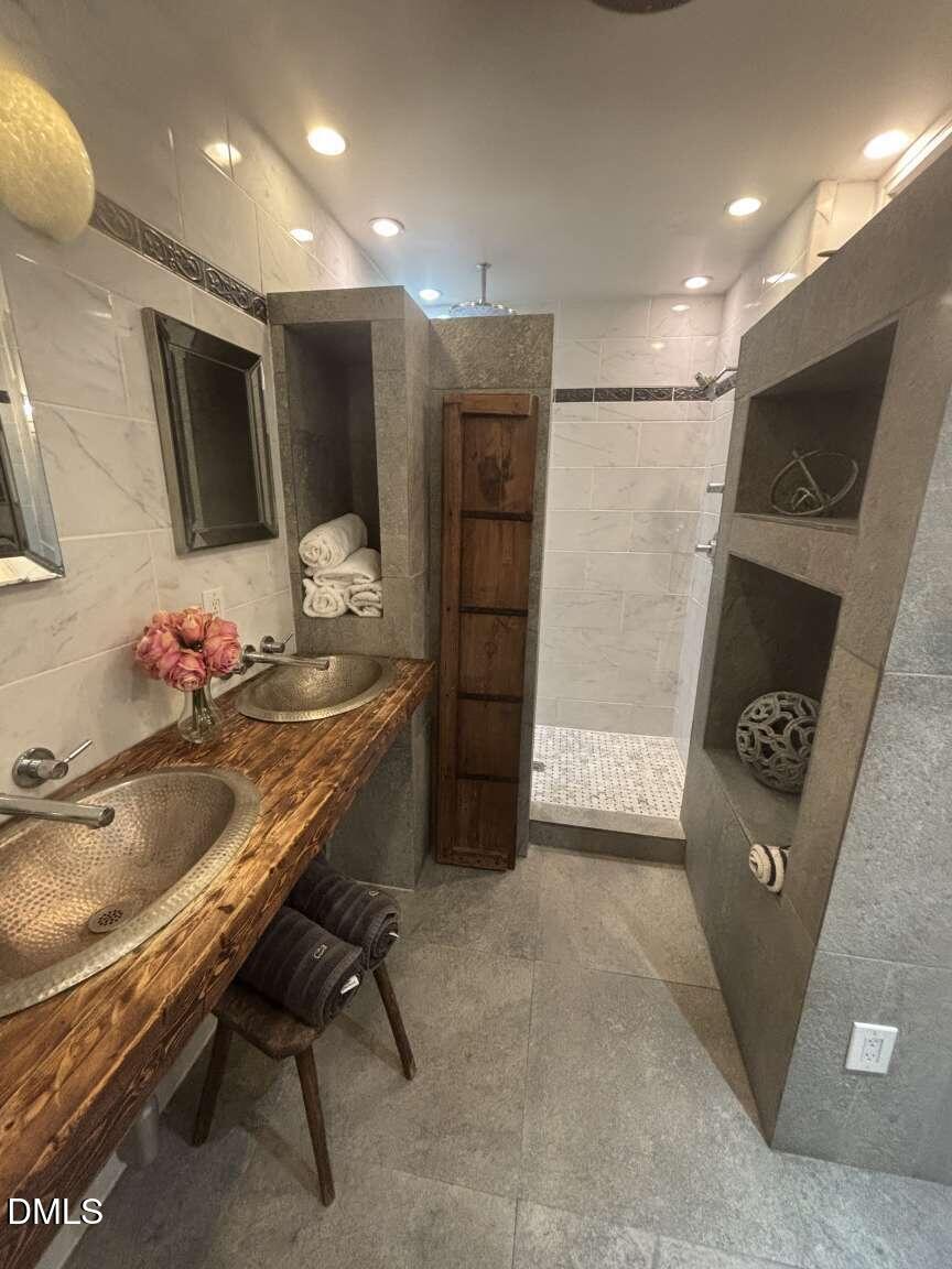 1204 Queensferry Road Cary, NC 27511 - Photo 18 of 50 a kitchen with a table and chairs in it