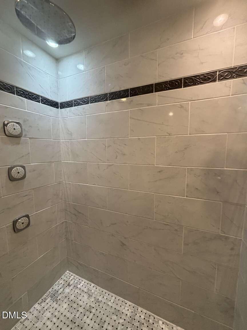 1204 Queensferry Road Cary, NC 27511 - Photo 19 of 50 a bathroom with a shower