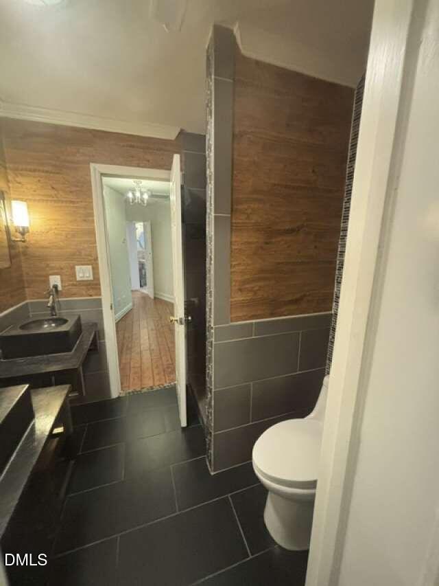 1204 Queensferry Road Cary, NC 27511 - Photo 26 of 50 a bathroom with a toilet and a shower