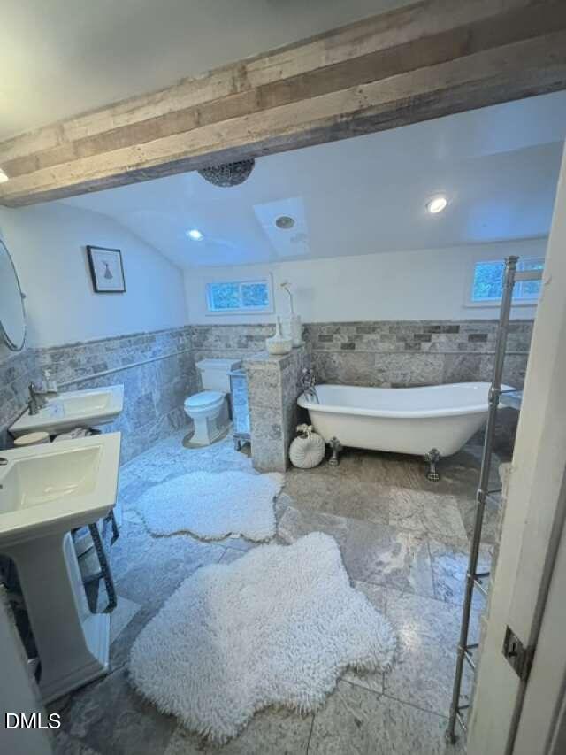 1204 Queensferry Road Cary, NC 27511 - Photo 32 of 50 a bathroom with a sink and a mirror