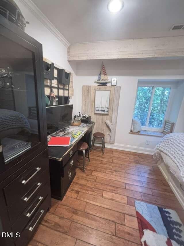 1204 Queensferry Road Cary, NC 27511 - Photo 33 of 50 a living room with furniture and a wooden floor