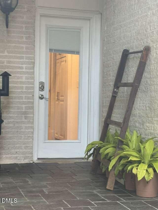 1204 Queensferry Road Cary, NC 27511 - Photo 38 of 50 a view of entryway with a wooden door