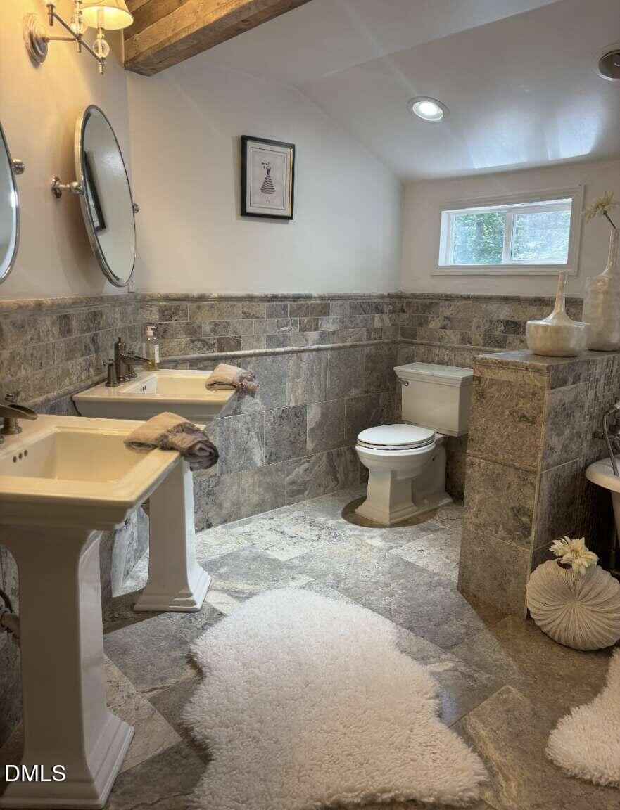 1204 Queensferry Road Cary, NC 27511 - Photo 40 of 50 a bathroom with a sink toilet and mirror